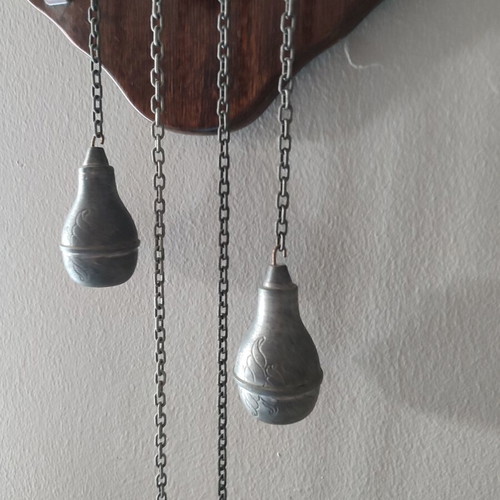 Wall clock made of solid walnut wood and pewter details like new