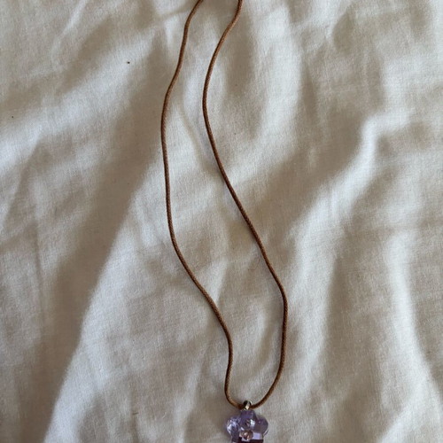 Swarovski daisy necklace used, purple