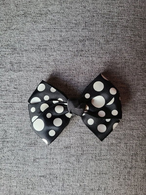 Hair bow like new, polka dot with black and white clip
