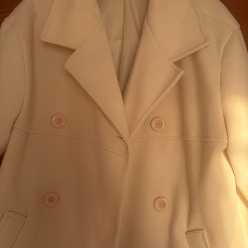 Coat in cream color like new