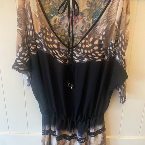 Relish long top new with elastic hem and deep back