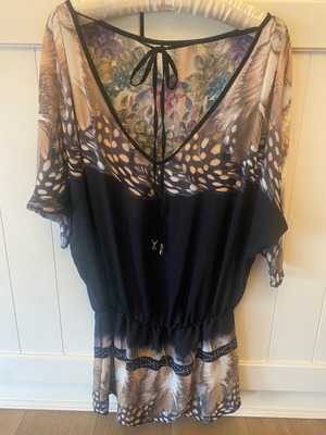 Relish long top new with elastic hem and deep back