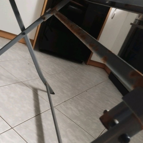 Outdoor table with glass top and metal used