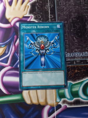 Monster Reborn Yu-Gi-Oh! card near mint