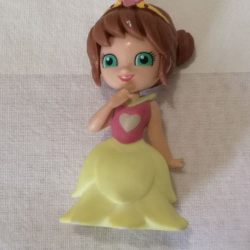 Girl figure with yellow dress used
