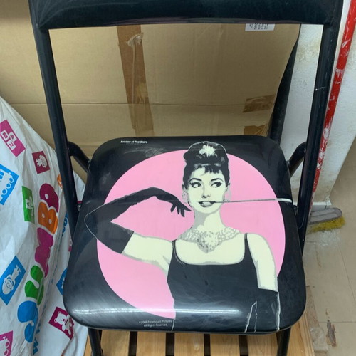 Chair with design used with minor wear