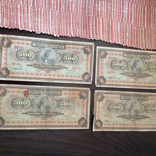 Old collectible banknotes used, 7 of 1000 drachmas and 4 of 500 drachmas