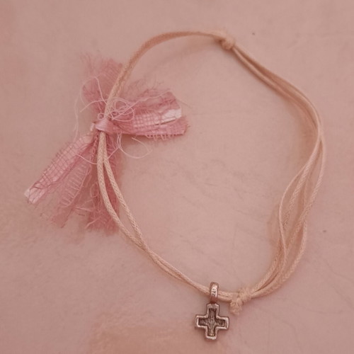 Bracelet with cross like new, white and pink