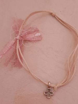 Bracelet with cross like new, white and pink