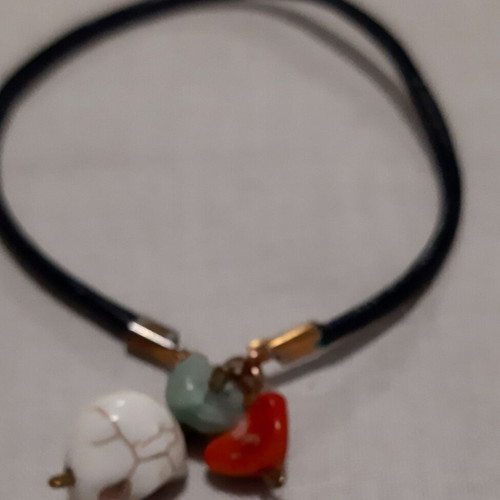 Skill bracelet with copper charms and genuine black leather