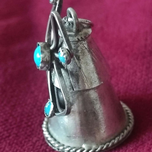 Silver pendant used, windmill shape with turquoise stones