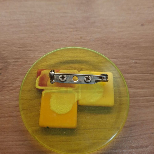Plastic pin new, pink and yellow