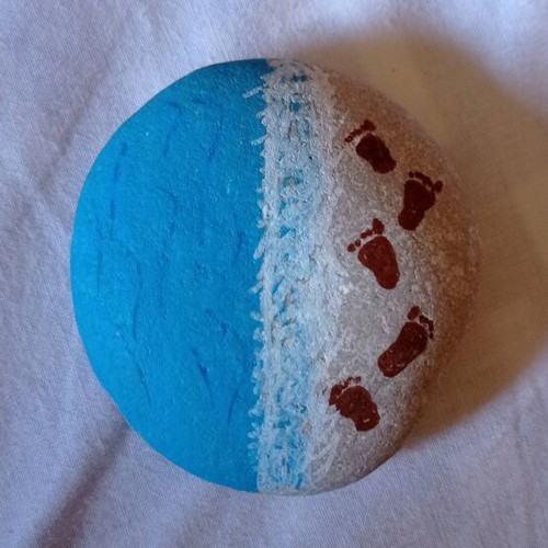Painted stone new with acrylic colors and matte varnish