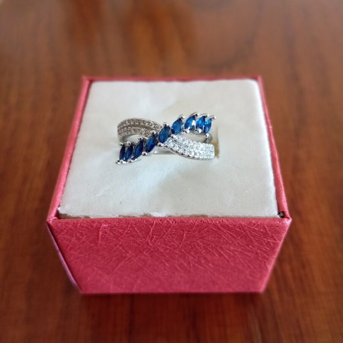 Ring new, gold plated with blue and silver zircon stones, size 7