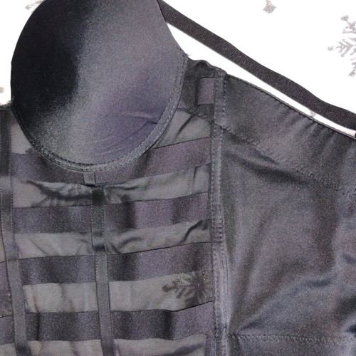 Black bustier used with transparency and adjustable straps