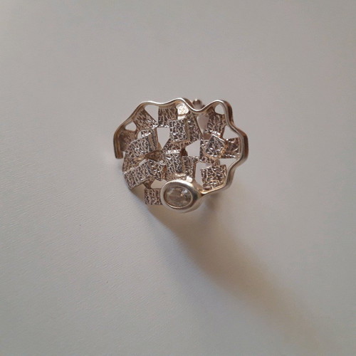 Silver ring used with original design