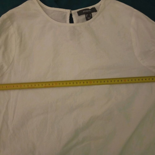 Primark white cotton blouse like new, Large with cut-out designs