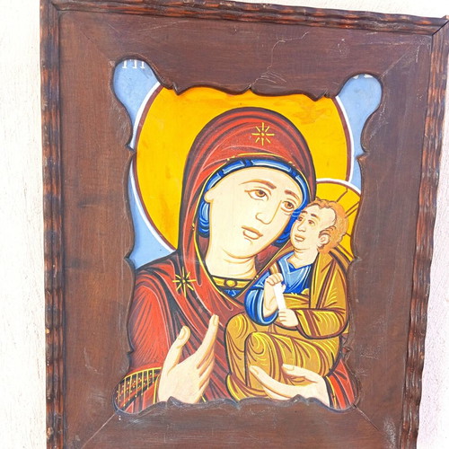 Religious icon on canvas used, wooden frame with missing bottom molding