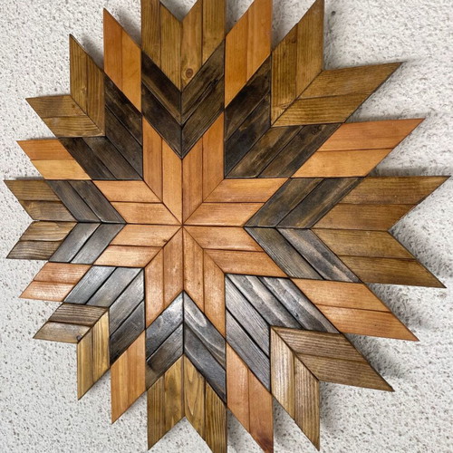 Handmade wooden wall art with geometric Aztec design Ø53 cm