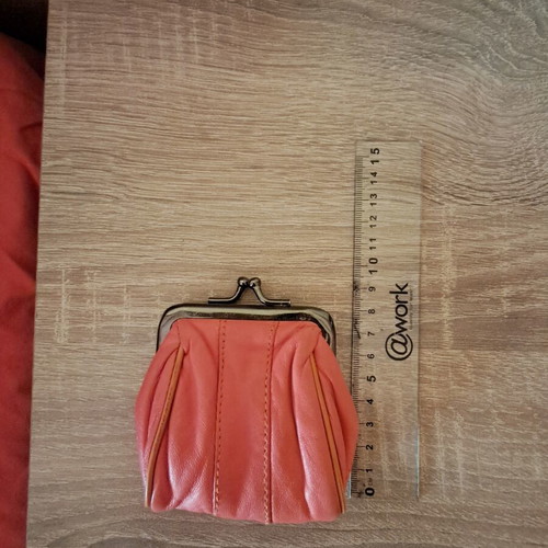 Wallet used, coral color, for coins or other use