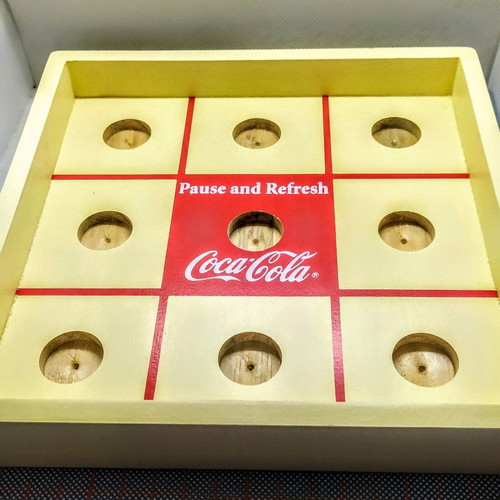 Wooden tabletop Tic Tac Toe game by Coca-Cola