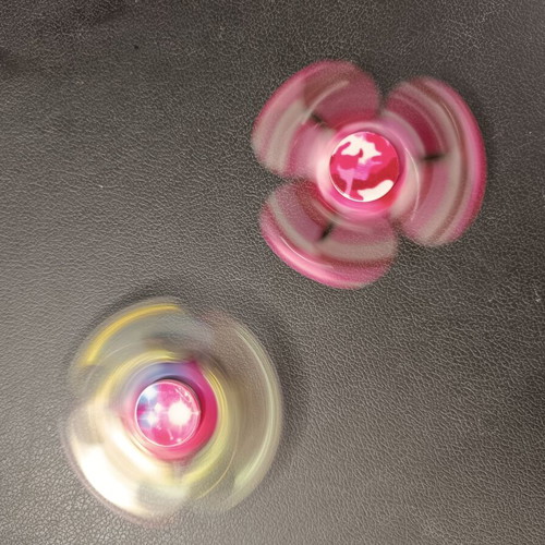 Fidget spinner set of 2 used with pink and purple designs