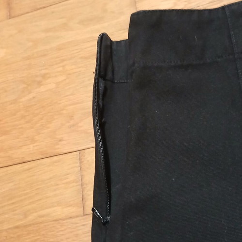 Kookai black mini skirt with pleats and decorative studs size small like new
