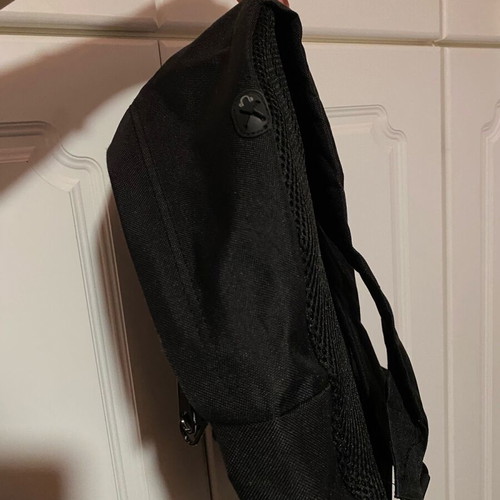Black backpack medium-large size used