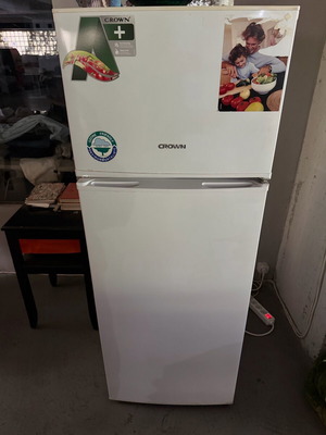Crown refrigerator with freezer and fridge used in excellent condition