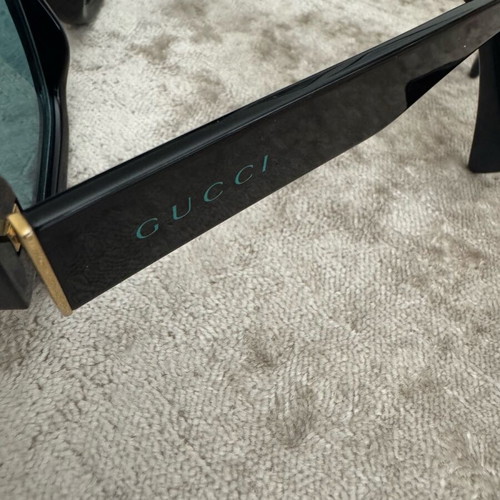 Gucci sunglasses new with acetate frame and light green lens