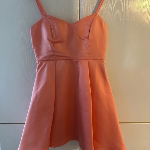 Peach dress like new size L with bow detail on back