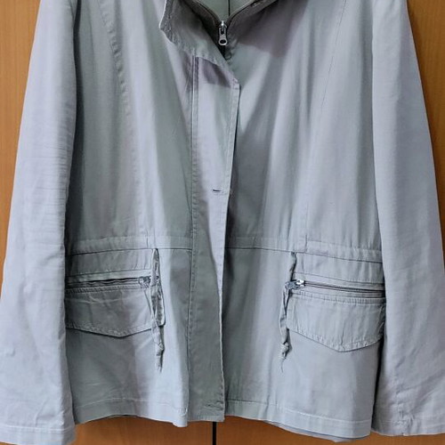 Spring outerwear beige like new, size 54