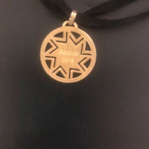 Aeolos Zolotas 2018 pendant like new, collectible, gold color