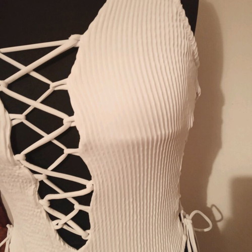 One-piece swimsuit used, white, size M with laces