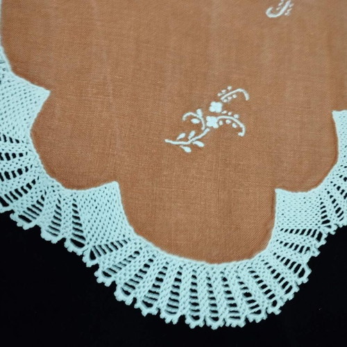 Handmade embroidery with crochet lace used