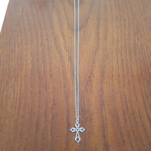 Steel cross like new, silver color