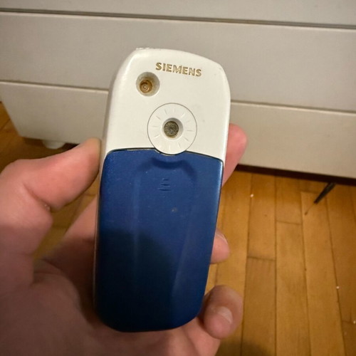 Siemens C65 mobile phone used, blue, keypad intact