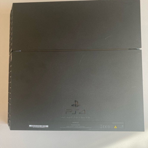 PlayStation 4 Fat 500GB console used with DualShock 4 controller