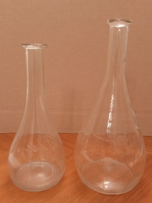 Vintage glass carafes with engraved floral design, pair