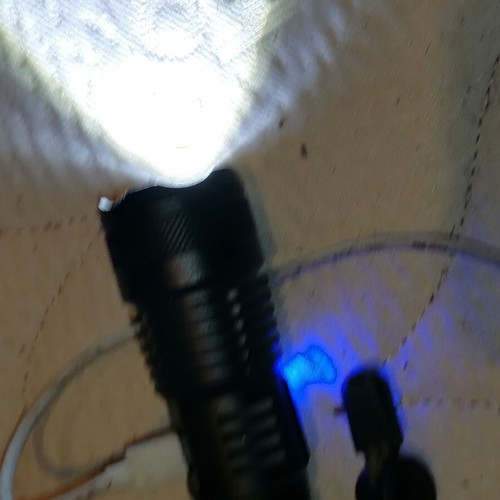 Professional flashlight with 4 lighting levels and USB new