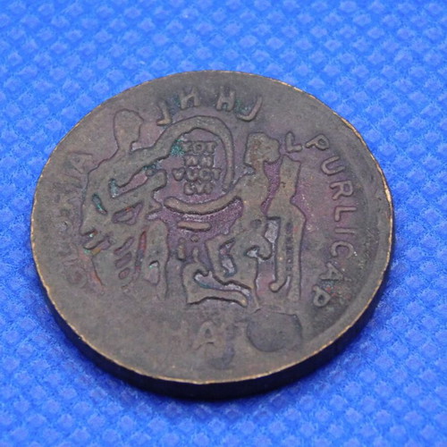 Decorative bronze medal with relief design