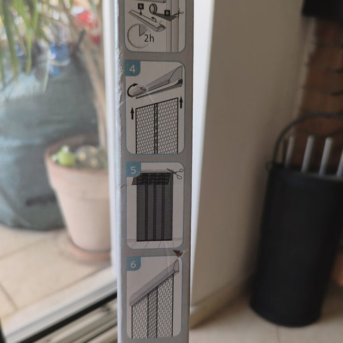 Door screen new with strips and adhesive base
