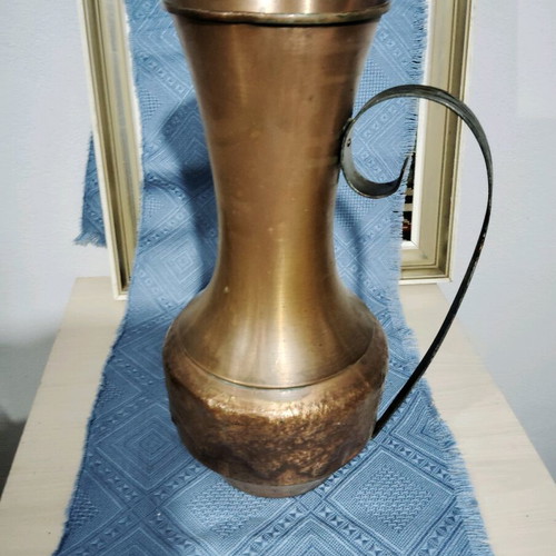 Large old copper pitcher used