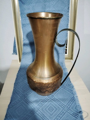 Large old copper pitcher used