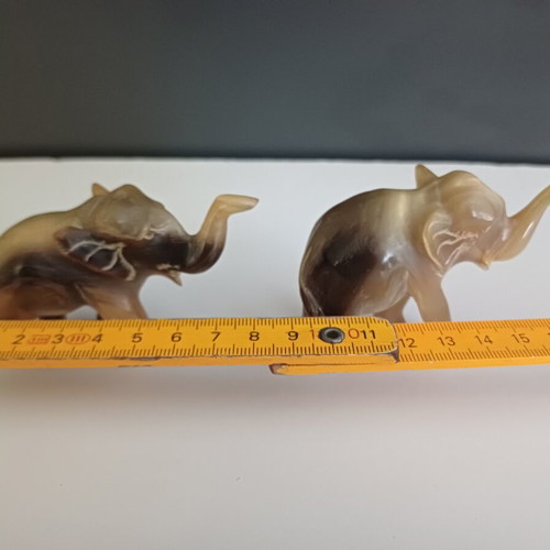 Carved elephant figurines used, set of two, missing tusks