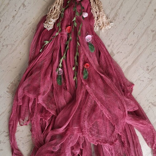 Handmade decorative wall doll with ceramic face and burgundy dress