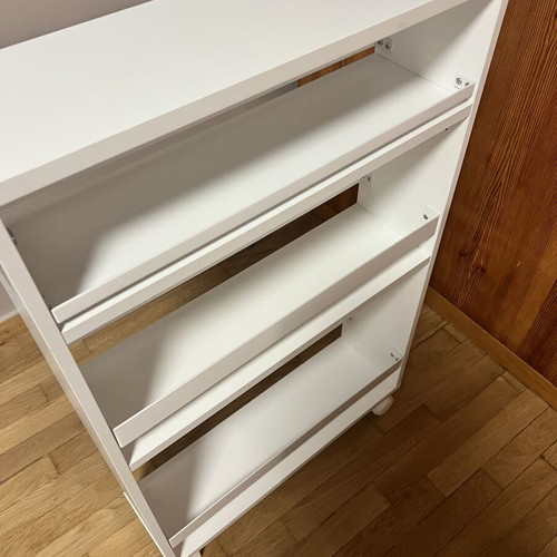 White kitchen shelf unit with adjustable shelf and wheels