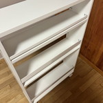 White kitchen shelf unit with adjustable shelf and wheels