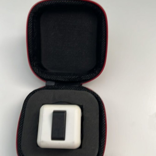 Fidget Cube used with protective carrying case, white and black