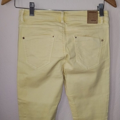 Stradivarius pastel yellow skinny jeans like new, distressed style